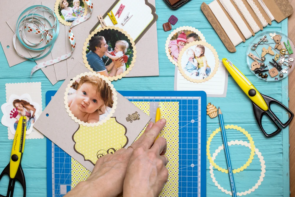 scrapbook background. the process of creating a childrens album. Card and tools with decoration